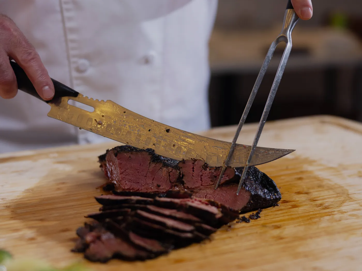 Pastrami carved by hand at Greenwich & Delancey.